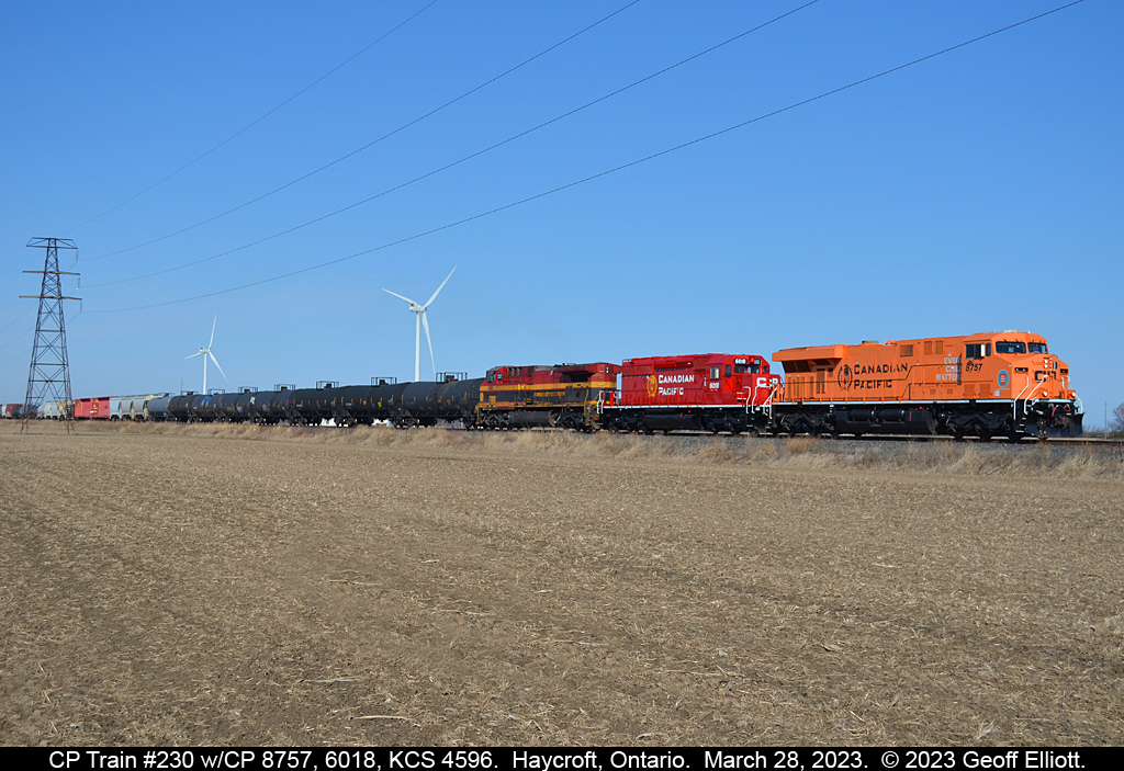 CP's "Every Child Matters" unit #8757 leads a colorful trio through Essex County on a clear March day as it approaches Haycroft, Ontario.  In addition to ECM #8757 we have a freshly rebuilt CP SD40-2 #6018 and a KCS AC44CW #4596 to add a 'splash' of color to what has been a very dreary Winter.