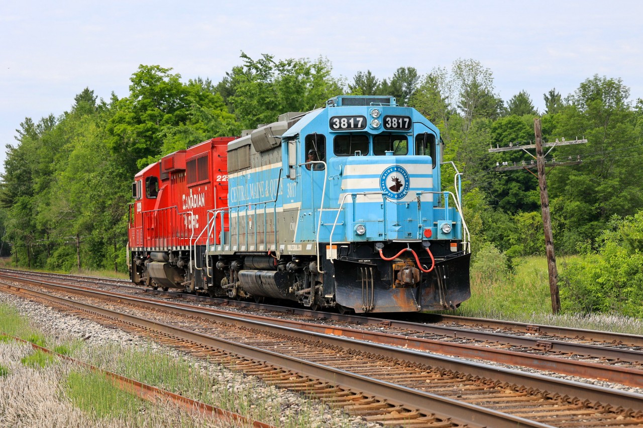 CP 2229 and CMQ 3817 powering CP G65-15 (ex- CP F55), running around their train at Elliott