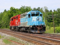 CP 2229 and CMQ 3817 powering CP G65-15 (ex- CP F55), running around their train at Elliott