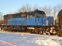 Lakeline 911, MLW RS18, idles at the Netley Grain elevator waiting for its next run.