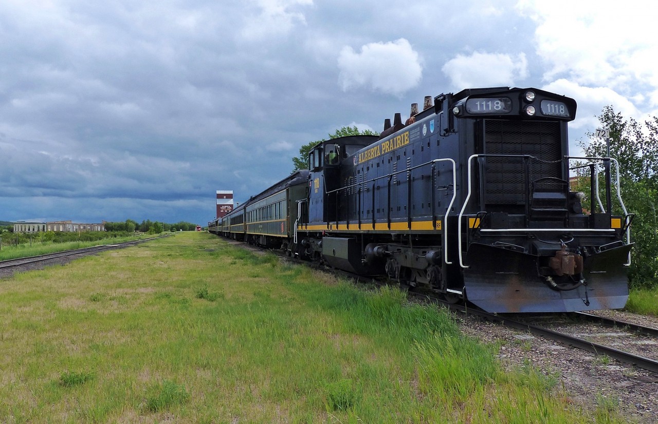 The locomotive is APXX 1118(GMD1) formerly CN 1118(GMD1) built in 1958 and currently in use by Alberta Prairie Rail Excursions. In the background to the left you can see remnants of the Big Valley roundhouse.