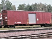 A railroad's ability to reuse and adapt older, no longer needed, equipment for new uses and purposes can be amazing.  Take CN 72026 for example:  built by CC&F in 1959 as a double deck auto transporter in the 720000 series.  After the introduction of 89 foot bi and tri level auto racks, the car was converted to passenger train service (note the passenger trucks) in 1972 as part of CN's car-go-rail program and renumbered to 9503.  It was eventually converted again to work train service in 1993 as the 72026.  The paint scheme on this car is rather unique as the "CN" is in the passenger red/orange paint versus the traditional white paint on other freight and work service cars.  