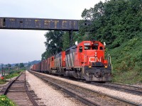 With lots of reefers and TOFC on the head-end, CN Extra 5031 East drifts downgrade under the old Canada Crushed Stone conveyor at mile 4.2 on the CN's Dundas Sub.
