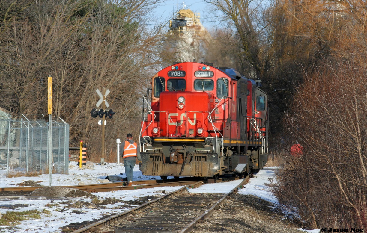 CN L542 with GP9RM’s 7038 and 7081 have just completed their set-off at Hunt’s Logistics in Cambridge, Ontario on the Fergus Spur and will soon end their day at the Eagle Street crossing. As of fall 2022, CN no longer keeps L542 at the Cambridge outpost as it is now based out of Kitchener.