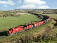 In early morning light Saskatoon to Regina freight 958 crosses the Qu'Appelle valley just north of Regina