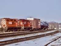 This was one of my early favourite locals, after loosing the MLW’s I turned my attention to the rebuilt GP9’s. When CP stopped running locals out of Guelph Junction, most traffic destined to the junction was brought from West Toronto. Typical power back then was a pair of GP9U’s, which usually arrived at Guelph Junction around mid morning. Unfortunately a big downturn in the economy in the second half of the he 2000’s would end this train for good and today the switch off the main at the east end of the junction has been removed.  This day the local was running late, arriving in the mid afternoon with the empty “sprint” frame train hot on its block. Lead unit 8228 somehow was positioned long hood forward fir the trip and I’m sure the crew were not all that happy. Not long after 8228 was reassigned to the former D&H and spend most of its remaining years there until its retirement. 