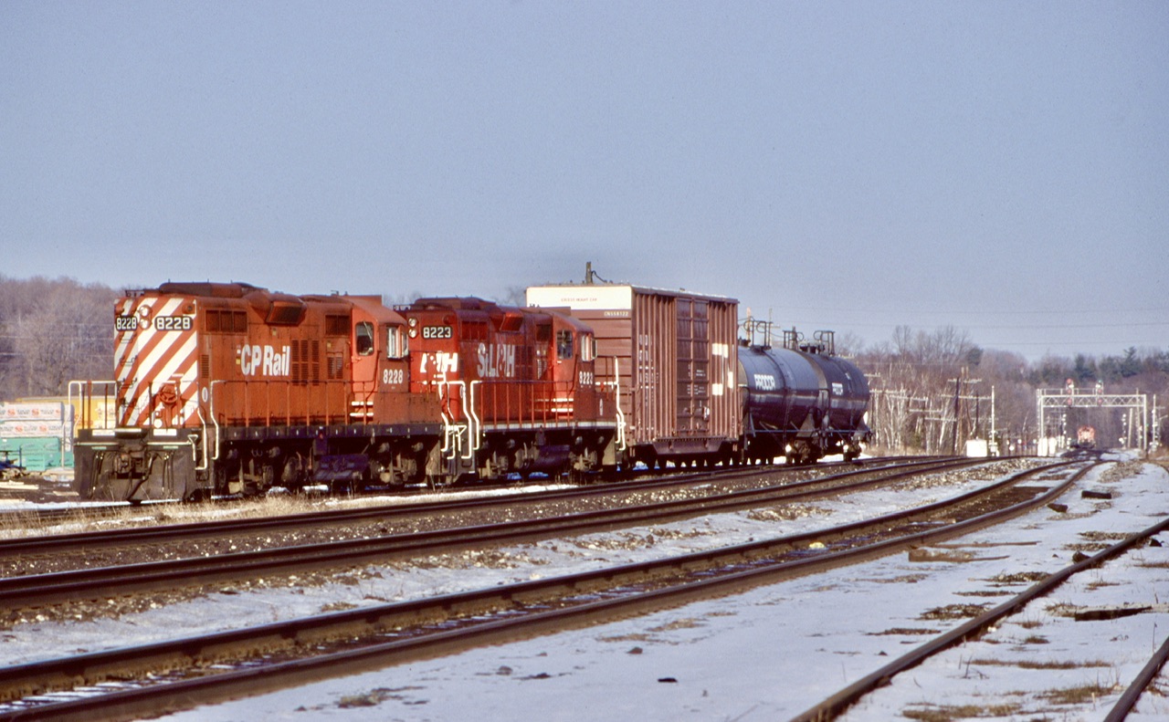 This was one of my early favourite locals, after loosing the MLW’s I turned my attention to the rebuilt GP9’s. When CP stopped running locals out of Guelph Junction, most traffic destined to the junction was brought from West Toronto. Typical power back then was a pair of GP9U’s, which usually arrived at Guelph Junction around mid morning. Unfortunately a big downturn in the economy in the second half of the he 2000’s would end this train for good and today the switch off the main at the east end of the junction has been removed.  This day the local was running late, arriving in the mid afternoon with the empty “sprint” frame train hot on its block. Lead unit 8228 somehow was positioned long hood forward fir the trip and I’m sure the crew were not all that happy. Not long after 8228 was reassigned to the former D&H and spend most of its remaining years there until its retirement.
