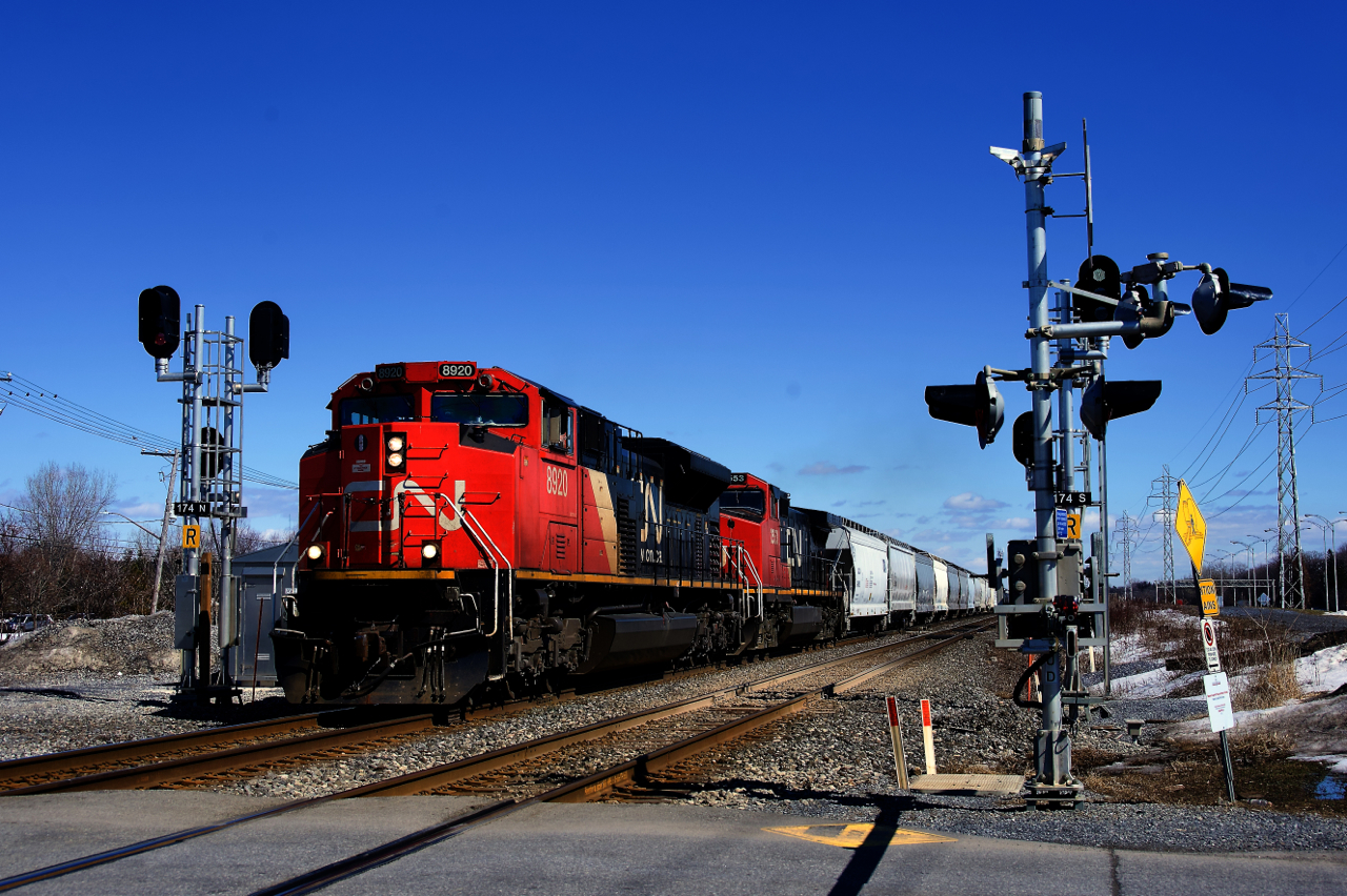 CN 369 splits the intermediate signals at MP 17.4 of the Kingston Sub with CN 8920, CN 2553 and 141 cars.