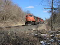CN 5720 CN 2599 and CN 5650 are working hard as they pull 397 up the escarpment at Mile 9 on the Dundas Sub..