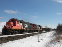 CN 7515 and CN 7509 lead L551 up the grade on the south track of the Halton Sub. between Tansley and Ash. The planned meet with 435 at Ash didn't quite go as planned as 435 was delayed for about an hour, most likely snagged by the detector at Mile 36.