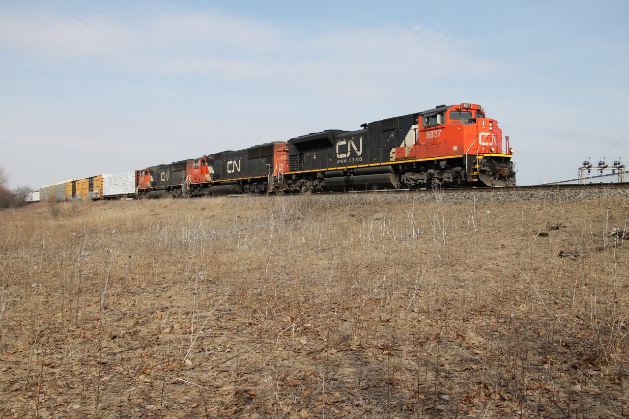 CN 8837 CN 5747 and CN 5726 are providing the braking as they slowly make their way toward Burlington West.
