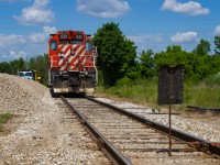 On a warm June afternoon, what I believe is OSR Guelph Junction Railway division's job #2 has stopped short of a Rule 41/841 red flag while wyeing their power on the Guelph North Industrial Spur. 