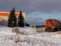 A pair of Zebra GP38-2s drills the XTL industry beside Etobicoke North GO station in the evening sunlight. CN 4730 & 4713 are pulling ahead to grab another cut of boxcars, as they pass a local Home Depot. This shot is pretty fun since further up the line, CN L529 works a Home Depot loading facility a few times a week.