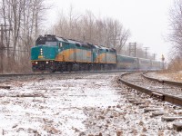 In the early stages of a massive snowstorm, VIA 63 rips through the neighbourhood of Guildwood with F40PHs 6411 and 6435. At the time, 6435 had just returned to service a few days prior after an extended period of time where it was getting repaired. The spur on the right leads to DOW Canada, an industry that gets worked by CN 546 a few times a week. 