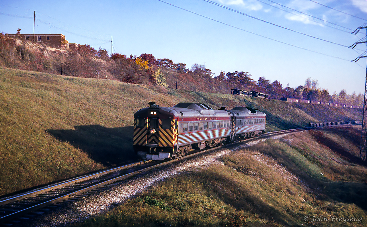 Nearing its final destination of Toronto Union Station, daily except Sunday train 381 from Havelock approaches the Bayview Avenue overpass on the Don Branch.Scan and editing by Jacob Patterson.