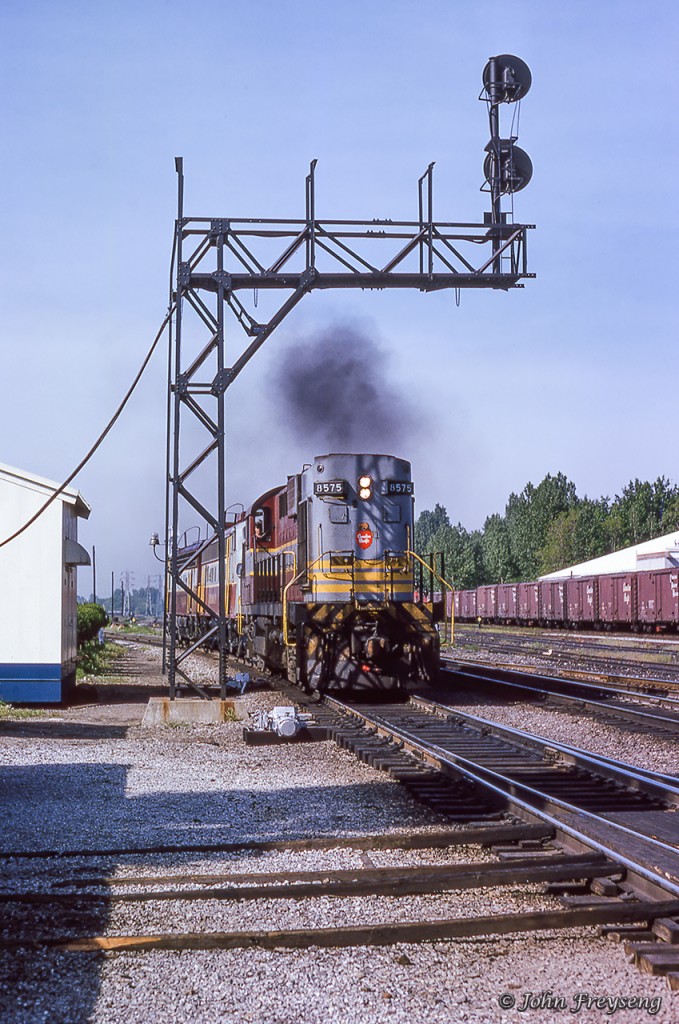 A light power move consisting of RS10 8575 and FP7As 1411, 1416 comes off the Don Branch at Leaside en route to Agincourt diesel shop from John Street roundhouse.Scan and editing by Jacob Patterson.