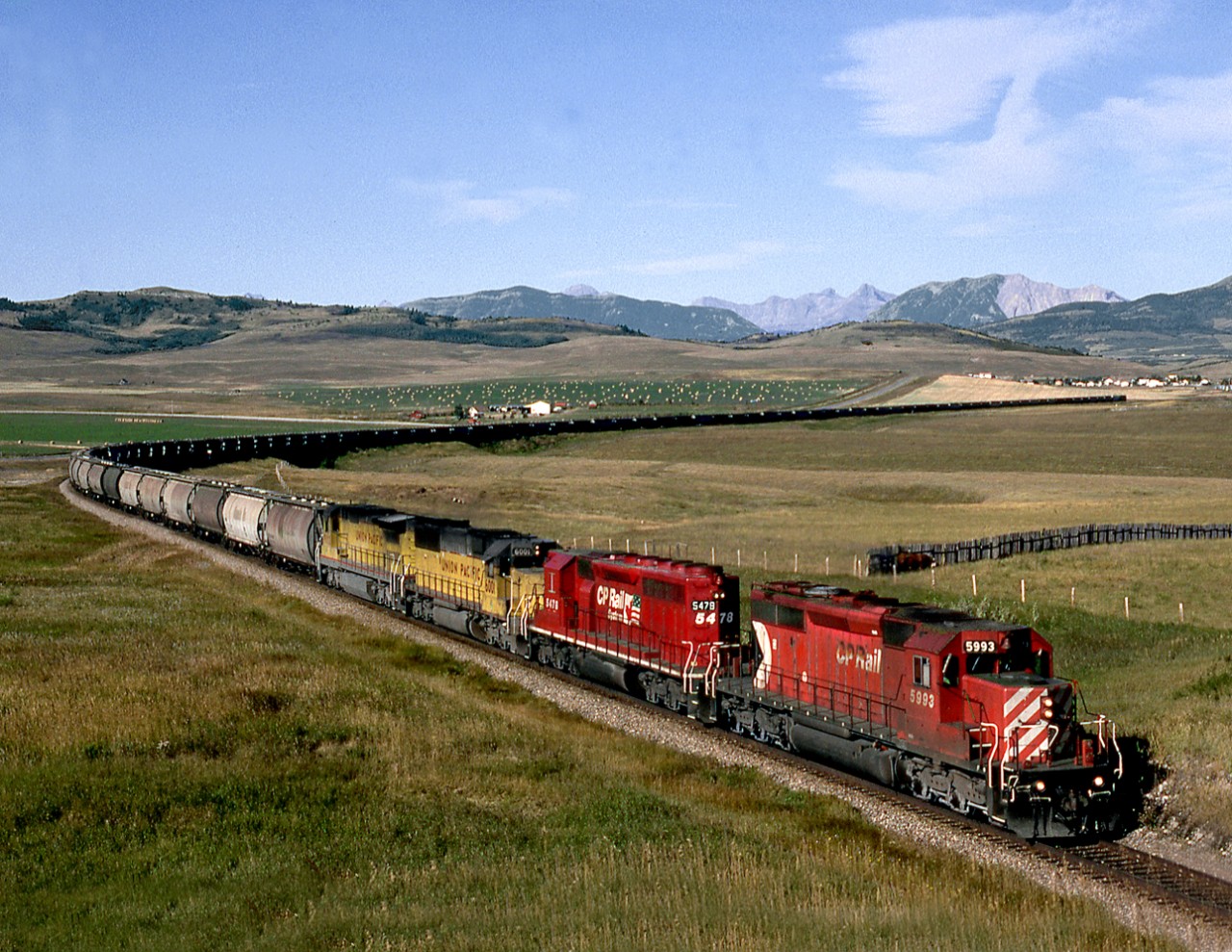 Potash empties off the Union Pacific at Kingsgate B.C. have just crossed Crowsnest Pass and is crossing the high plains between Lundbreck and Cowley