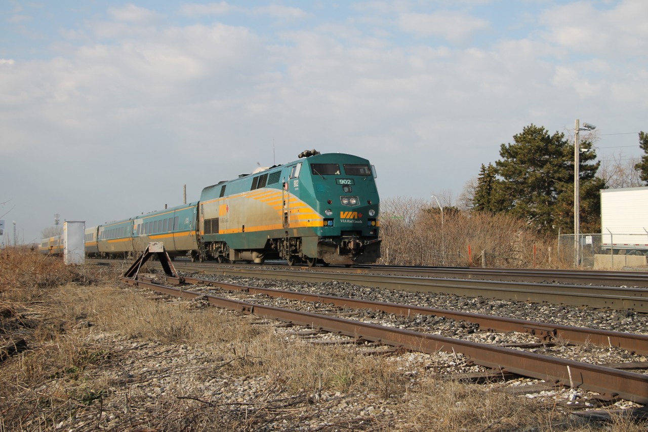 VIA 902 has #70 up to track speed passing over Appleby Line, Burlington, next stop Oakville.