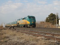 VIA 902 has #70 up to track speed passing over Appleby Line, Burlington, next stop Oakville.