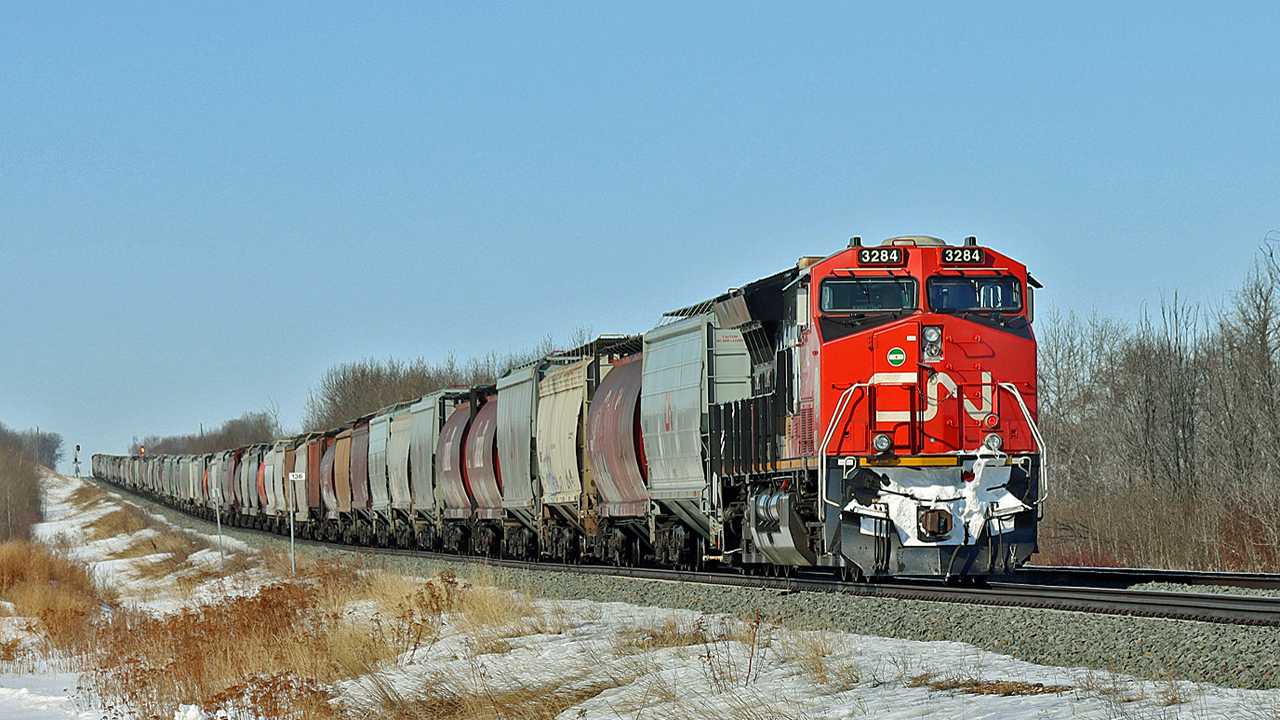 CN 3284 has a grain train tied down at East Wainwright.