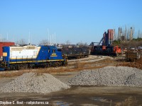 With Stelco looming in the background, the Hamilton yard 0800 job is about to lift gondolas from Sunrise metals while RLK 4003 waits for it's next role. Parked after the Southern Ontario Railway lost their lease in December 2018, 4003 would be re-activated by the Lambton Diesel Services folks in 2022 and is now <a href=http://www.railpictures.ca/?attachment_id=50734 target=_blank>painted for GIO Rail. (Mooney)</a>
