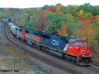 A boring leader on an otherwise not so boring day. Check out the two trailing units. I think I only saw 3 of those things. An hour after this train i'd chase <a href=http://www.railpictures.ca/?attachment_id=9012 target=_blank>this one north</a>. Oh to go back.