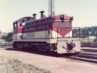 TH&B 53 is an NW-2 from EMD in LaGrange, IL with serial number 5705, built in January of 1948. It was sold to Atlas Specialty Steel in Welland, ON for scrap in May of 1988. I captured it around the Aberdeen Yard complex back in the summer of 1974.