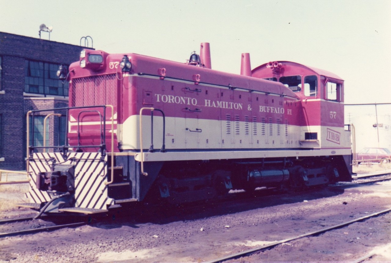 While wandering around the old roundhouse and shop area near the Aberdeen Yard back in July of 1975 I came across a nice clean TH&B 57 taking a break from switching duties. TH&B 57 is an SW-9 from GMD in London, ON with serial number A-123 built in December 1950. Information I have gathered suggests it was sold back to GMD in London, ON in May of 1989. There's those plug-in marker/class lights again!