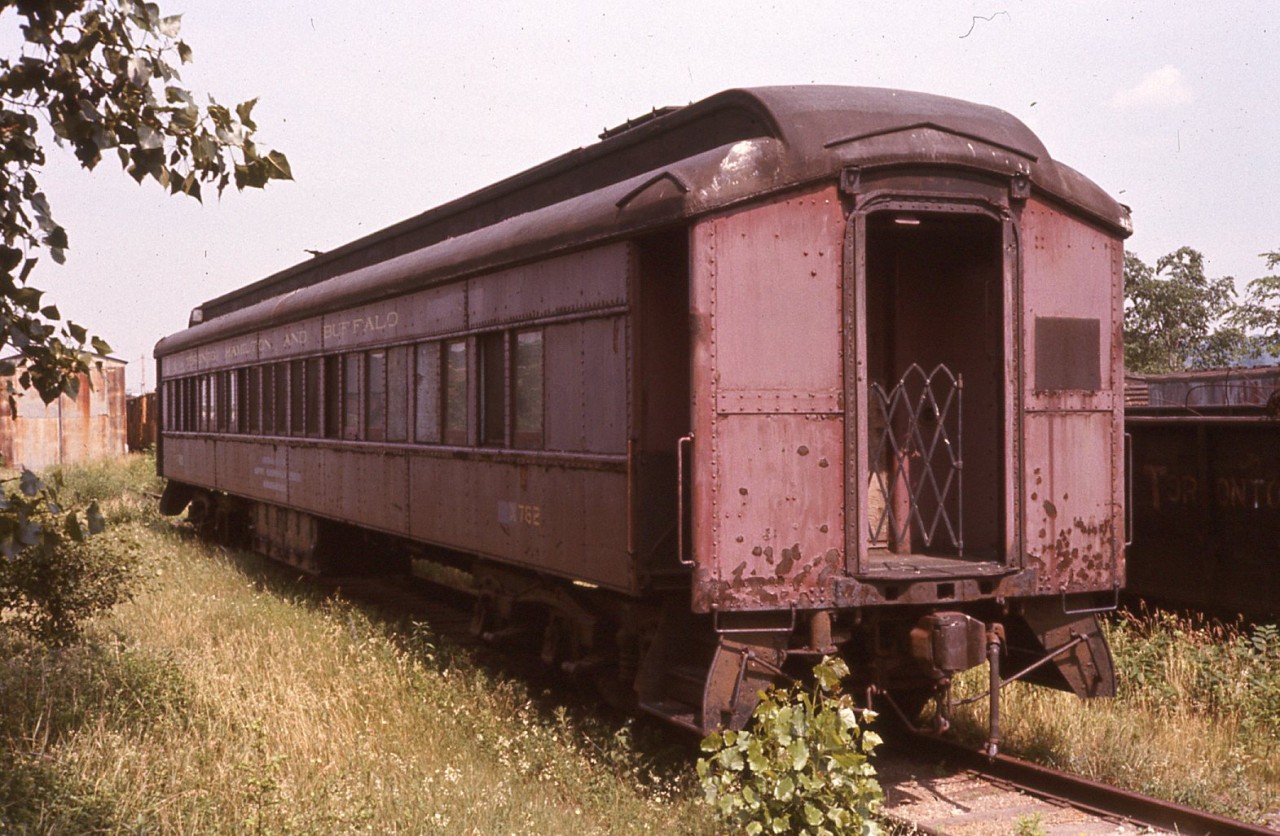 Here is an opposite side view of an post I submitted several years ago of TH&B X 762. While it may not look like it, this bunk car was still in service and was a home-on-the-road for members of the TH&B wrecking crew. This coach along with several others were stored 'ready to go' at TH&B's Aberdeen Avenue yard in this mid-1976 photo. 

http://www.railpictures.ca/?attachment_id=5871