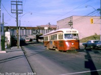 TTC PCC 4010 (A1-class, part of the first order of PCC's built new for Toronto by CC&F in 1938) heads eastbound on Queen Street West at Gladstone Avenue on the Kingston Road route, passing through the Parkdale area of Toronto and climbing out of the dip under the CN Weston Sub and CP Galt Sub railway underpasses (the "Queen Street Subway", built in 1897). Some CN 40' boxcars occupy the closest bridge span, which is painted fresh silver with the then-new CN "noodle" logo in black. A TTC GM New Look bus follows behind the streetcar, possibly a Dufferin bus lining up for turning north onto Gladstone (navigating the "Dufferin Jog" traffic had to make around the railway underpasses.
<br><br>
<i>Original photographer unknown, Dan Dell'Unto collection slide.</i>
<br><br>
<i>Note: This slide is a little soft on the right side. Apparently in the 1960's there was an unknown US-based transit photographer (possibly a fellow named John H. Eagle) who took many photos on his US and Canadian travels with a slightly misaligned lens, that always showed on the right side in his slides (making them easy to identify). By the 70's it appears the unknown photographer had it fixed or upgraded to a better camera.</i>