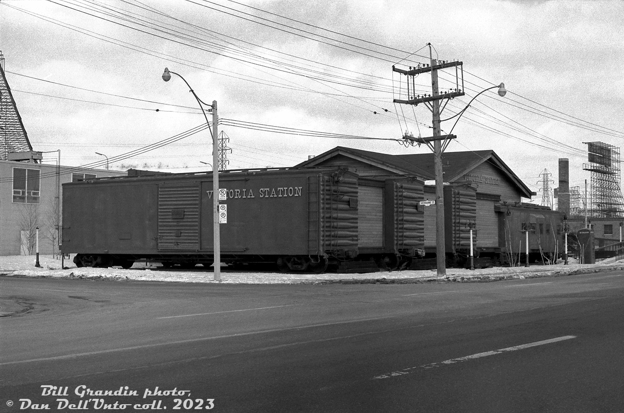 Notorious freight car photographer Bill Grandin couldn't resist a photo or two of this: the Toronto location of the Victoria Station restaurant at 190 Queen's Quay East at Sherbourne Street, featuring a selection of old retired freight cars as part of its dining establishment along Toronto's harbourfront to the east of Yonge Street, amid old industrial port buildings and warehouses. The Canadian Trackside Guide lists the equipment's lineages as five 50' boxcars of Illinois Central or Gulf, Mobile & Ohio origins, plus one bay-window caboose (former Southern Railway X3103).

Online sources indicate Victoria Station was a railway-themed steakhouse restaurant chain that started off in the US during the 1960's, and grew to over 100 locations before its decline and eventual bankruptcy problems in the mid-80's. The Toronto location, later operating as the Town & Country Buffet Restaurant, was closed and demolished near the end of the 2000's for redevelopment, a trend that continues today as much of the old industrial building along this stretch of Queen's Quay get torn down for waterfront high rise office towers and condos.

Bill Grandin photo, Dan Dell'Unto collection negative.
