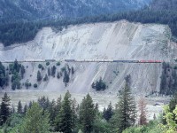 <br>
<br>
   “ The Scar “
<br>
<br>
    Fanning in the Fraser Canyon.....
<br>
<br>
   And Red VIA  F's !
<br>
<br>
   Daily.
<br>
<br>
  ex CP FP9A #1422 – CP Rail GP9 #8571 – Ex CP FP9A #1407 – VIA (ex CP) F9B #1961 (DH).
<br>
<br>
  In the Fraser Canyon near Lytton, the view from the Trans Canada Highway, VIA #2, May 14, 1980 Kodachrome by S.Danko
<br>
<br>
  On this and similar track sections a track maintenance crew jigger would follow most trains – especially the westbound loads – to watch for debris sprung loose by the vibrations created by the passing train(s). Unknown to what extent this practice continues...
  <br>
<br>
  Interesting:
<br>
<br>
  Early VIA power assignments, almost exclusively the respective power was assigned to the original owner road, at least until the units were repainted into VIA livery: ie rare to see ex CN painted units on CP Rail and vice versa. Some exceptions did apply:
<br>
<br>
     <a href="http://www.railpictures.ca/?attachment_id=  46119 ">  CP Rail on CN   </a>
<br>
<br>
sdfourty



