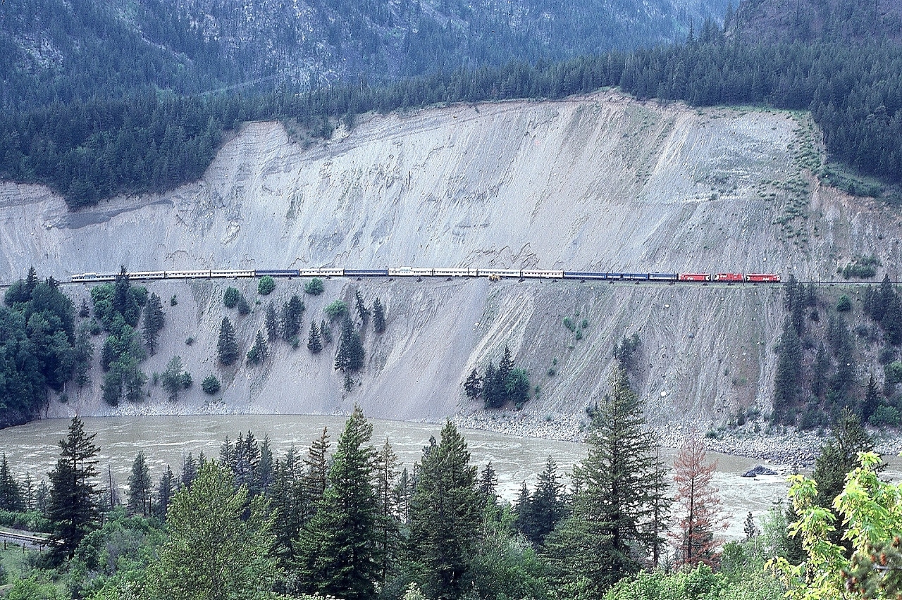 “ The Scar “


    Fanning in the Fraser Canyon.....


   And Red VIA  F's !


   Daily.


  ex CP FP9A #1422 – CP Rail GP9 #8571 – Ex CP FP9A #1407 – VIA (ex CP) F9B #1961 (DH).


  In the Fraser Canyon near Lytton, the view from the Trans Canada Highway, VIA #2, May 14, 1980 Kodachrome by S.Danko


  On this and similar track sections a track maintenance crew jigger would follow most trains – especially the westbound loads – to watch for debris sprung loose by the vibrations created by the passing train(s). Unknown to what extent this practice continues...
  

  Interesting:


  Early VIA power assignments, almost exclusively the respective power was assigned to the original owner road, at least until the units were repainted into VIA livery: ie rare to see ex CN painted units on CP Rail and vice versa. Some exceptions did apply:


       CP Rail on CN   


sdfourty