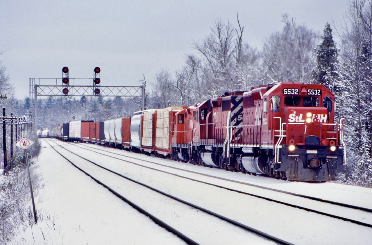 I consider these part of CP’s identity crisis years, with the creation of the Saint Lawrence & Hudson a lot of CP”s older power was sent to the east end of the system. This was the sink or swim years in the east for CP with rumours quickly spreading that CP was considering selling everything off. Thankfully this didn’t happen and eventually the STLH faded into history as all units that received this paint were either sold off or gradually repainted. I did kind of like the paint job and was happy to catch a few straight SD40’s late in their careers. Here a Hamilton bound train clears the Galt subdivision at Guelph Junction with clean looking STLH 5532 in the lead.