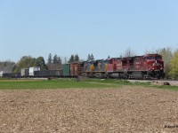 CP 246 heads down the Hamilton Sub through the farmlands of Flamborough on a beautiful spring afternoon in May 2021. Power was CP 8029-CP 8000-CSXT 929-CSXT 3063. 
