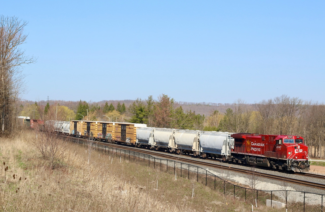 The goal today was to photograph at least one CPKC train on day1. It seemed fitting to find a brand new spot today as well, unfortunately in this area that’s a pretty hard task considering I’ve probably photographed almost every mile of this section of the Galt subdivision. Ever since Tremaine road was relocated and grade separation added I always wondered what the eastbound shot off the hill would look like. Unfortunately between the new fences and small trees added by the city the shot didn’t totally live up to my expectations but nevertheless a nice change of pace. Expecting this train to be 134, it was a surprise to see 234 with a solo GE show up. It appears lately when it does actually make it past Wolverton it also has mixed freight added ahead of the usual auto racks. The Niagara Escarpment can be seen in the background.