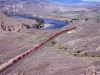 Alongside the Thompson River west from Savona, CP’s mainline climbs to Walhachin, and at the summit on the compass-south side is an outcrop of rock ideal for crushing into ballast, hence the two extra tracks beside the siding.  From the top of that rock, the view eastward on Sunday 1980-06-08 at 1635 PDT included a CP westbound, symbol train 67, with 5664 + 5785 + 57xx + 8501 for power, and in the distance down close to the river, CN’s Ashcroft sub. mainline.

<p>The area from Savona to Walhachin and Semlin to near Ashcroft is not blessed with many easy access points, but is well worth long walks, one of my “happy” places on this planet.