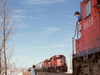 Winter 1993-1994 was a tough one for CP on the prairies, with deep cold causing delays due to malfunctioning locomotives, and to address that, mechanical department “riders” were sent to accompany trains to ensure they kept moving.  One rider sent to Moose Jaw was me, three weeks in February and March of 1994, and for a west coast kid, it was colder than ever experienced before or since!  But the open landscape and mostly clear skies and especially the outstandingly welcoming people made it memorable.

<p>On Thursday 1994-03-03, symbol train 953 from Moose Jaw west to Swift Current (essentially a wayfreight) had a known malperformer, SD40-2 5625, soon discovered to have a mis-set governor causing the engine to be overloaded at full throttle and die.  At Mortlach, 25 miles from Moose Jaw, we took the siding to meet 5672 and 5779 east at 1016 CST.  Conductor on the ground, engineer still on the engine, PK OK, highball.