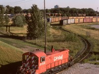 On a CP mechanical On-Line Failures team trip to Toronto in 1994, an amazingly hot evening walk from the hotel up Markham Road took me to the Finch Avenue overpass directly above the Toronto Yard station name sign, and not-yet-rebuilt SW1200RS 8159 passed below westward at an opportune time at 1904 EDT.

<p>CP 8159 escaped the CP switcher rebuild program, sold to Black River & Western in New Jersey in 1999 as their 8159, later BDRV 1259.