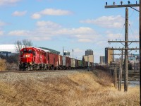 I had been spending the last 15 seconds staring at the clouds after E59 departed Regina with CP 3017 leading as shadows began blanketing the ground around me. Luckily a hole emerged last second and sunlight managed to strike the rare breed of AC power. This unit had been on my bucket list for this summer back home in the prairies as it's been locally assigned in the area for a few years, but managing to bag it by luck on my way to the Regina Railfest modeling show sure was nice.