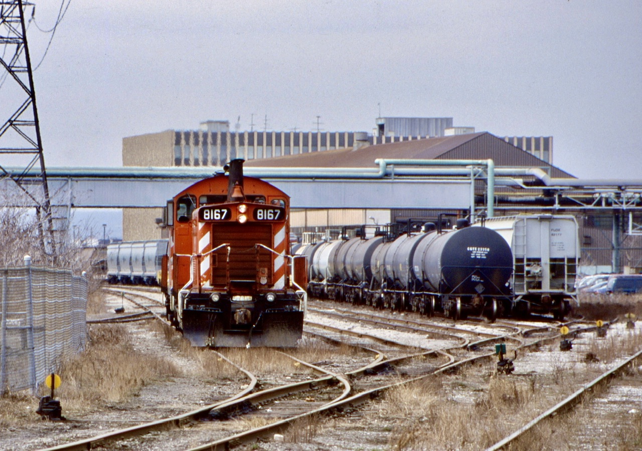 It was often interest visiting the deep industrial core of Hamilton back in the early 2000’s, and for a period it was possible to catch both CP and Railink ex CN SW1200’s working side by side. I was t that lucky this day, but did manage to catch up with the CP job this day with a pair of SW1200’s. The 8167 was a personal favourite for me as it’s the only one I’ve ever seen with a snow plow on both ends. The majority still had their original foot boards. The two “pups” have just dropped their train in the small yard here and are in the process of heading back to the other end.