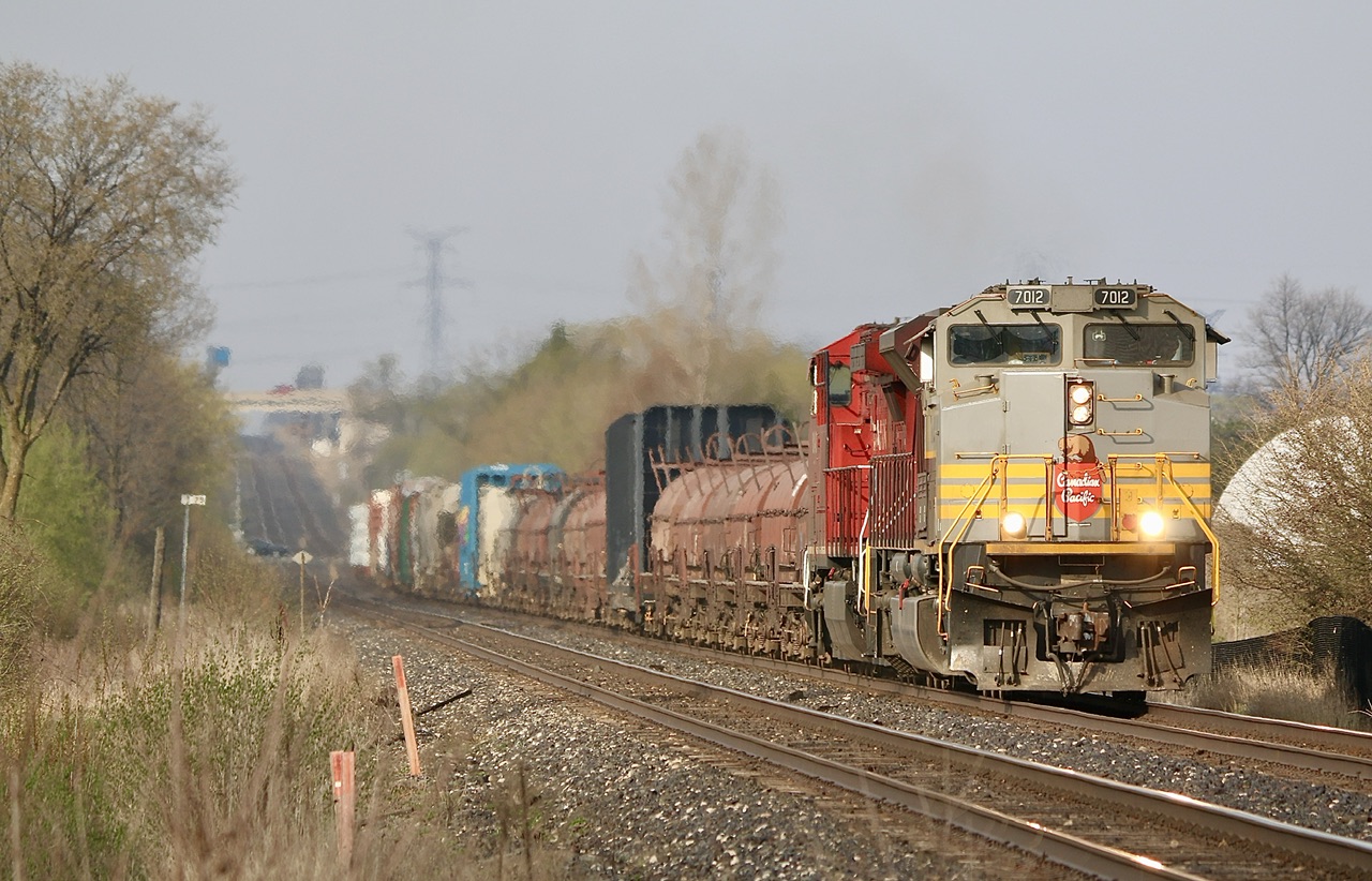 With the sad loss of heritage unit sister 7011 in a wash out on the former CMQ a couple days earlier, catching 7012 in the lead of train 236 was a nice tribute to it fallen siblings, 7005 reportedly was also damaged beyond repair. Train 236 here is seen getting back up to track speed after performing a 30 car tail end drop at Hornby yard well in the distance.