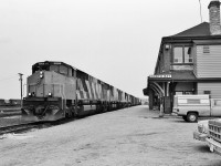 <br>
<br>
The 'in service' CP Rail North Bay station.
<br>
<br>
Likely the most  ' Kodachromed ' demonstrator locomotives...and in this image ' Kodak Plus-X ed ',
 <br>
<br>
CP Rail first #482, powered by the BBD HR616 Demonstrators #7004 – 7002 – 7001 – 7003, awaits re-crewing
<br>
<br>
 at the CP Rail North Bay station, May 22,1983, Kodak Plus X negative by S. Danko 
<br>
<br>
 <a href="http://www.railpictures.ca/?attachment_id=  43538">  Green Flags    </a>
<br>
<br>
sdfourty
