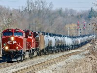 Easter Monday finds en empty westbound ethanol train digging hard into the grade up the Niagara Escarpment as the train makes its way through Guelph Junction in a beautiful spring day.