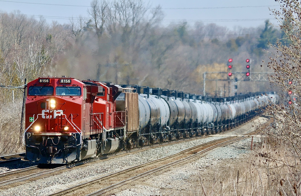 Easter Monday finds en empty westbound ethanol train digging hard into the grade up the Niagara Escarpment as the train makes its way through Guelph Junction in a beautiful spring day.