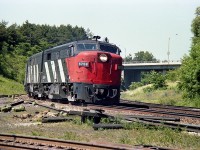 With 6758 (pictured) and 6759 the only two MLW FPA-2u that were part of the VIA fleet, I made sure to grab a
photo if I knew one was close by.
In this shot I am on the 'water' side of the CN Oakville sub (a no-no these days) shooting the passenger eastbound as it comes off the Dundas sub.  Interesting to note the "CN"on the nose had been recently painted out. I'm now wondering if anyone knows when this unit received its VIA makeover, and whether "CN" or "VIA" was applied to the nose.  Second unit I recorded as CN 6862.