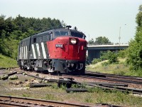 With 6758 (pictured) and 6759 the only two MLW FPA-2u that were part of the VIA fleet, I made sure to grab a
photo if I knew one was close by.
In this shot I am on the 'water' side of the CN Oakville sub (a no-no these days) shooting the passenger eastbound as it comes off the Dundas sub.  Interesting to note the "CN"on the nose had been recently painted out. I'm now wondering if anyone knows when this unit received its VIA makeover, and whether "CN" or "VIA" was applied to the nose.  Second unit I recorded as CN 6862.