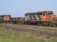 The 7526 is headed to pull out some tanks north of the main and bring them back over to Clover Bar yard. The missing marker lamp panel looks like it would be a good place for birds to nest. Plus, the 7526 is still paired with it's slug the 526.