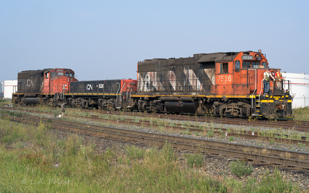The 7526 is headed to pull out some tanks north of the main and bring them back over to Clover Bar yard. The missing marker lamp panel looks like it would be a good place for birds to nest. Plus, the 7526 is still paired with it's slug the 526.
