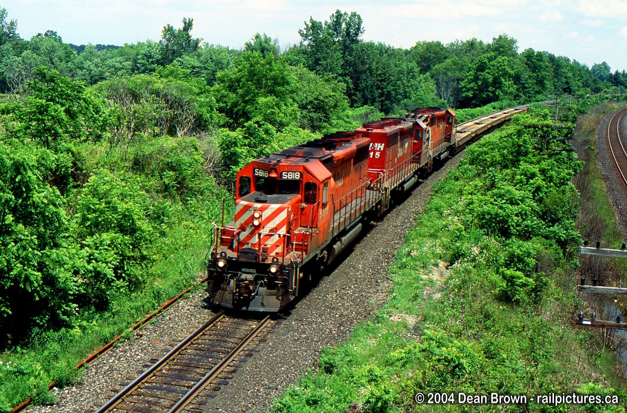 CP WB Expressway at Denfield Rd. approaching Lobo siding on the CP Windsor Sub this location is now overgrown and hard to get good photos here anymore. Use to be a great spot.